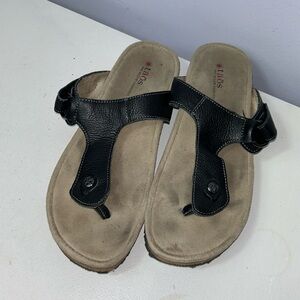 Taos Footwear Black Leather T-Strap Sandals with Tan Footbed